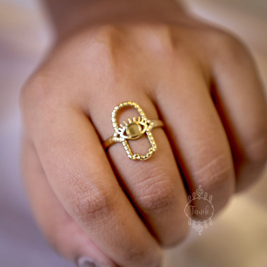 Adjustable ring with evil eye design