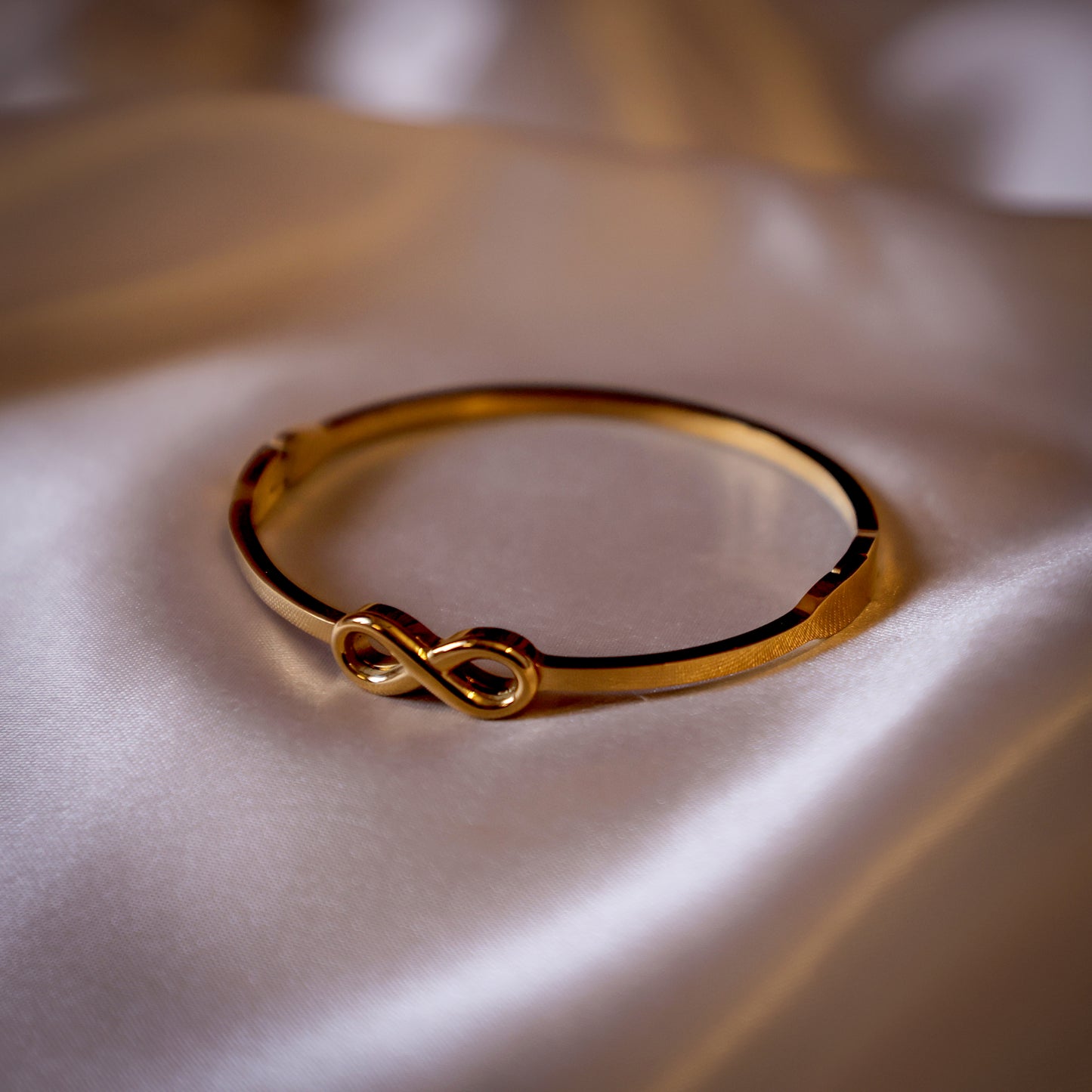 Stainless steel kada with inifinity design