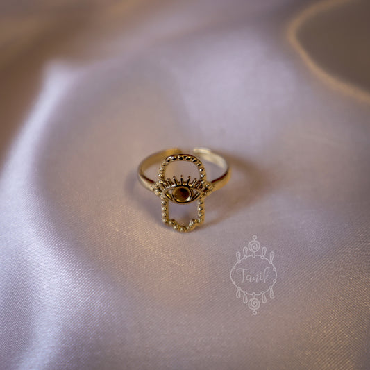 Adjustable ring with evil eye design