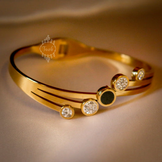 Stainless steel elegant kada with a combination of black and white rounds