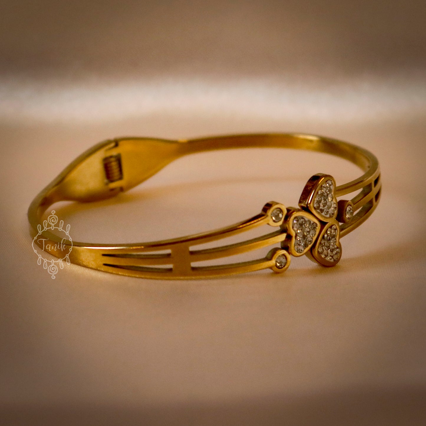 Stainless steel elegant kada with multi hearts design